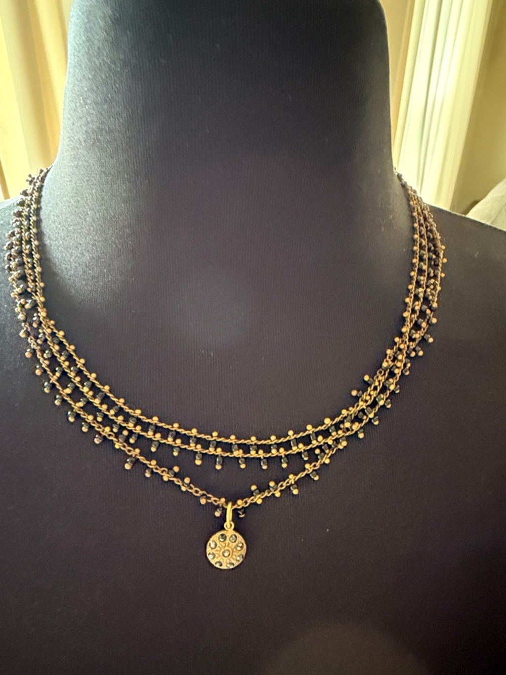 Catherine Popesco Gold Multi-Strand Beaded Necklace with Crystal-Studded Pendant